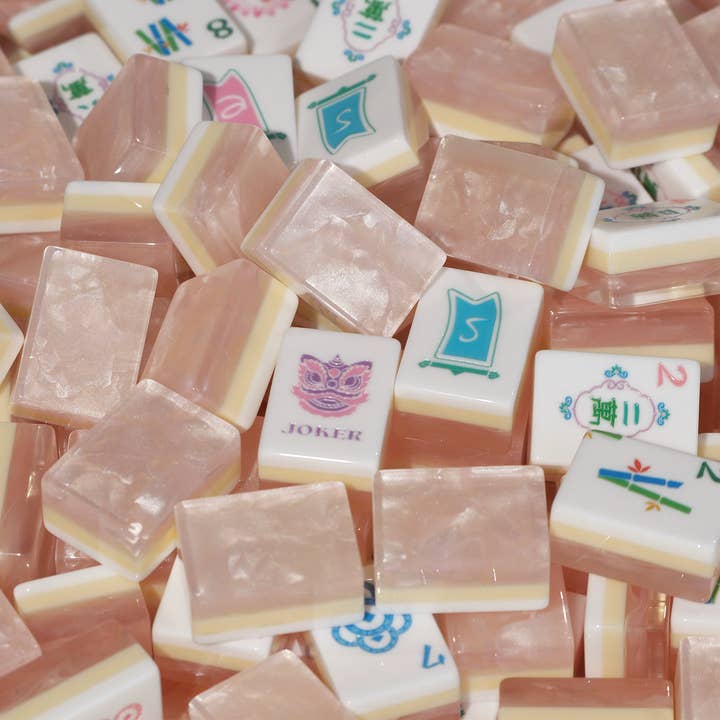 Garden Party Blush mahjong tiles stacked — pink floral faces with blush backs