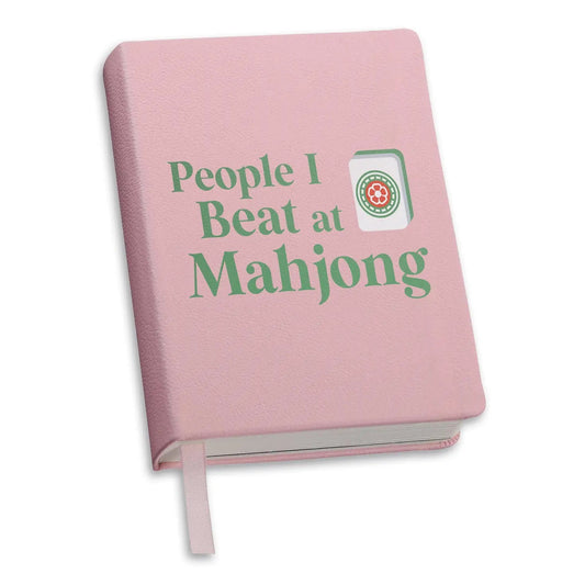 People I Beat at Mahjong Journal — pink leather journal with green lettering and dot tile
