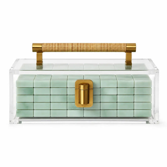 Brass and Raffia mahjong tile display case — clear acrylic case with raffia handle and brass turn-lock, holding green tiles