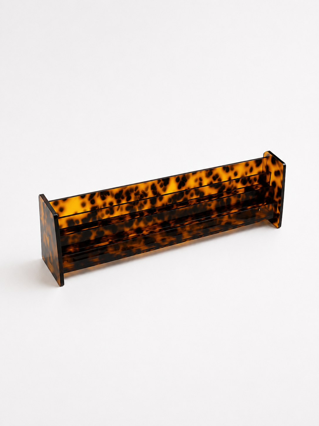 Tortoise acrylic card rack — empty two-tier tilted design