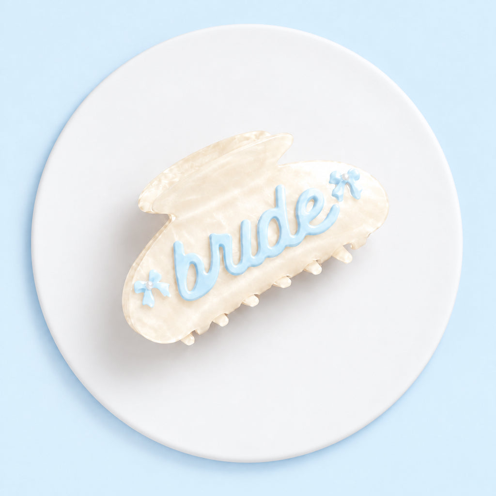BRIDE acrylic claw clip — white marble with blue bride lettering and bows